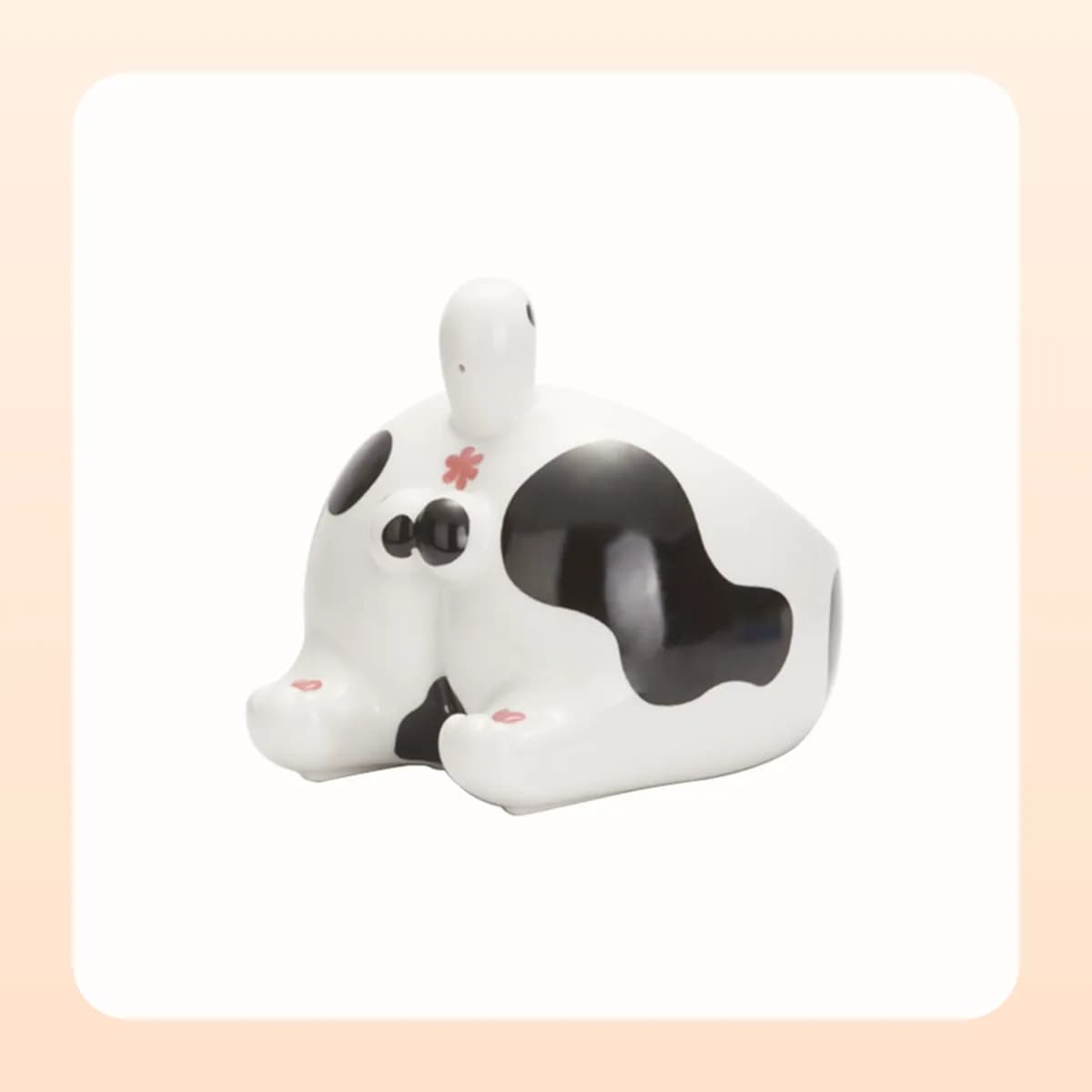 Kindral ceramic pet bowl in the cow pattern
