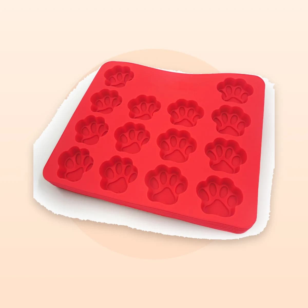 Kindral silicone treat mould with twelve paw shapes