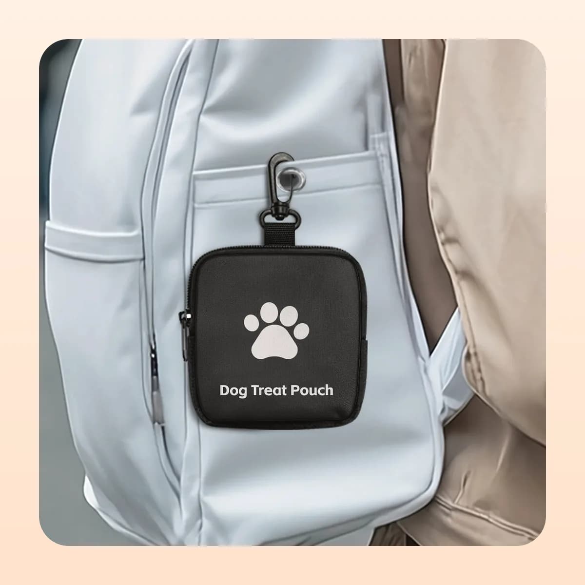 Kindral treat pouch clipped to a bag strap