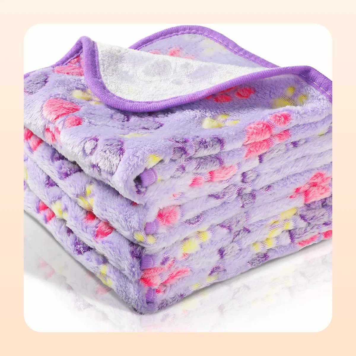Kindral paw-print fleece blanket in purple