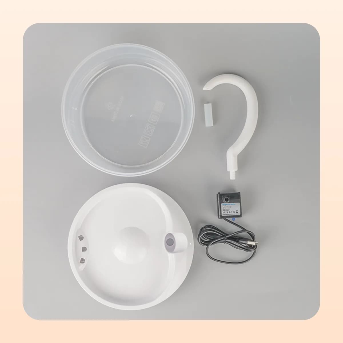 Kindral cat water fountain shown disassembled with pump and cable