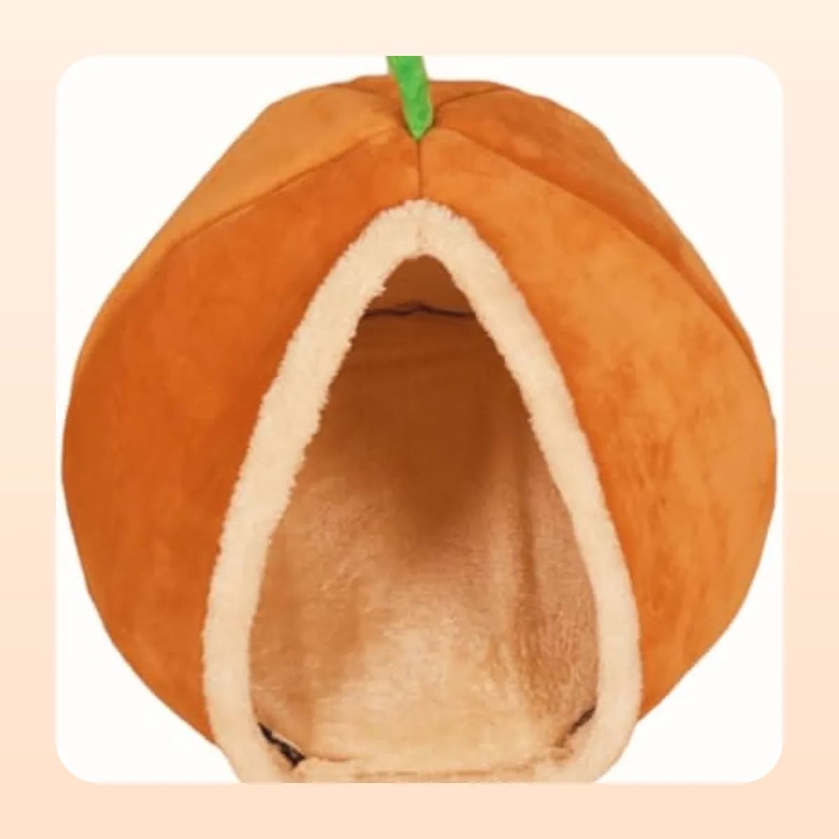 Kindral plush pumpkin cave bed with the sherpa-trimmed opening