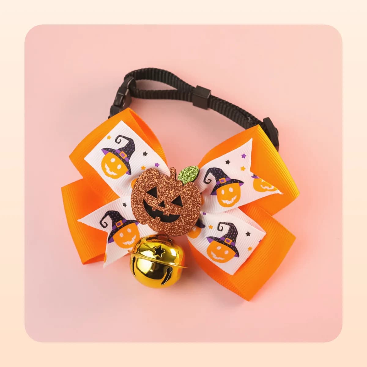 Kindral pumpkin bow tie in the witch-hat pumpkin print with a gold bell